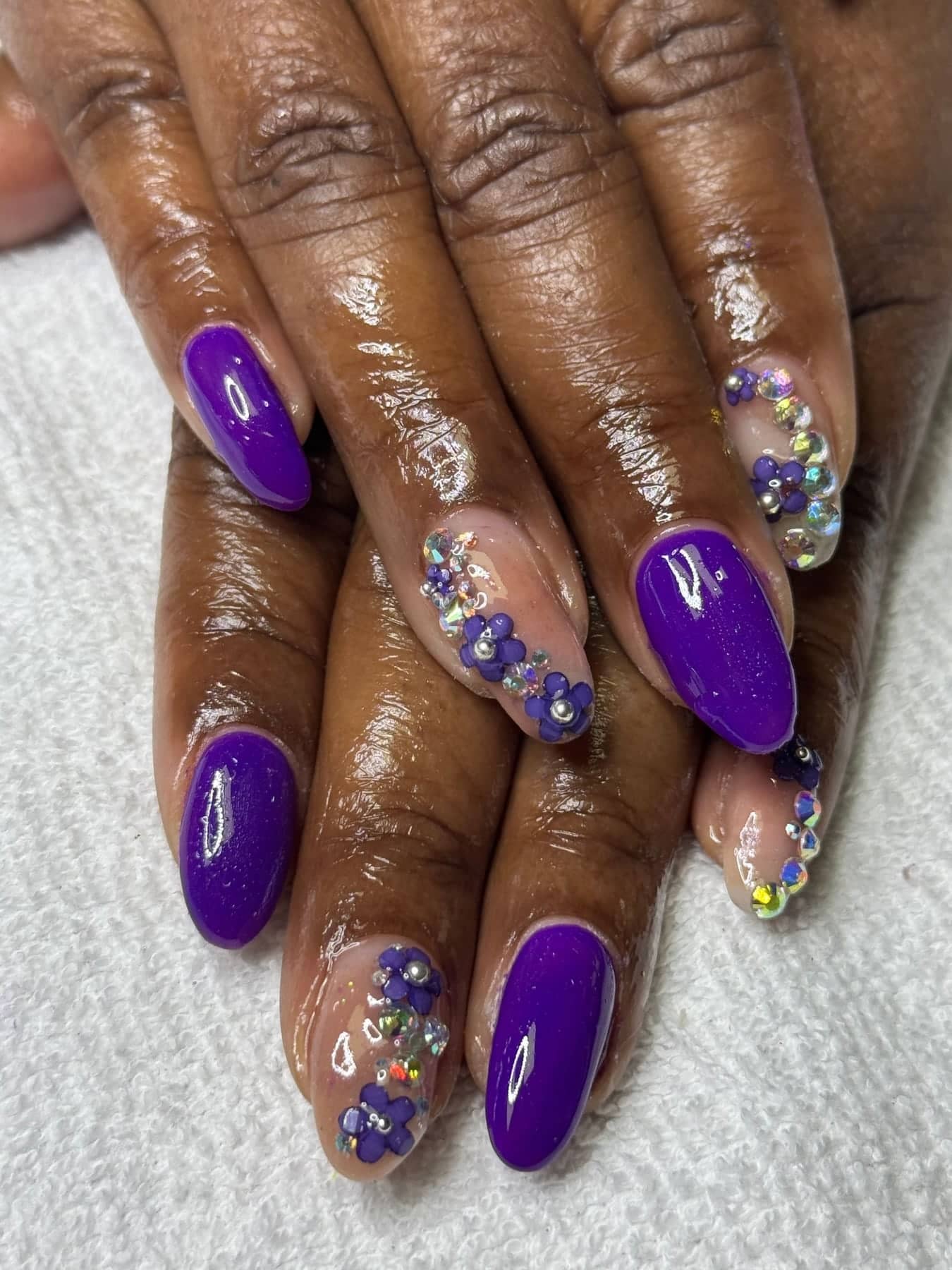 Violet nails with hand-painted florals