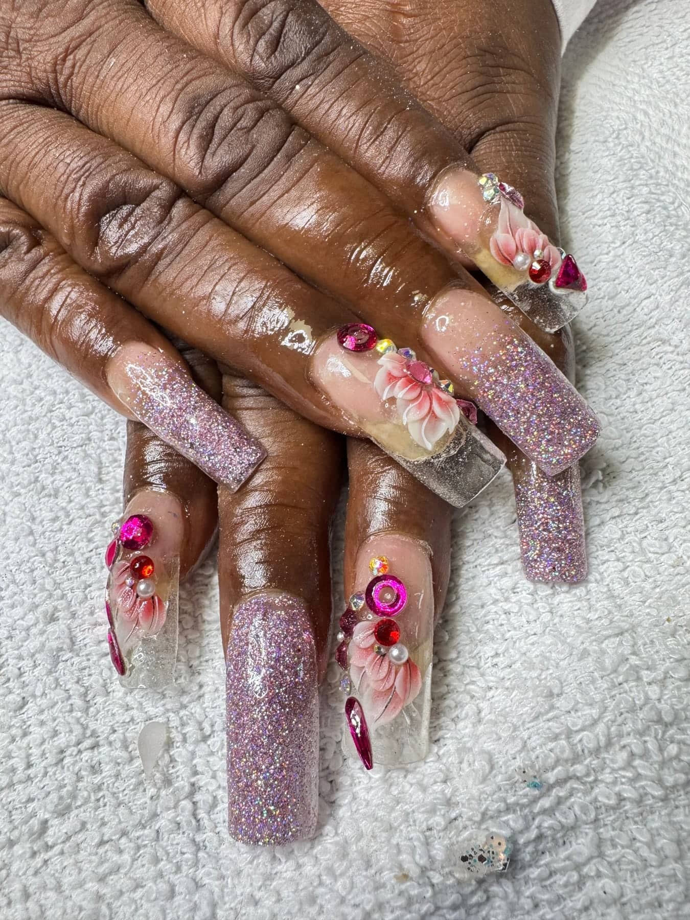 Lilac glitter nails with floral encapsulation