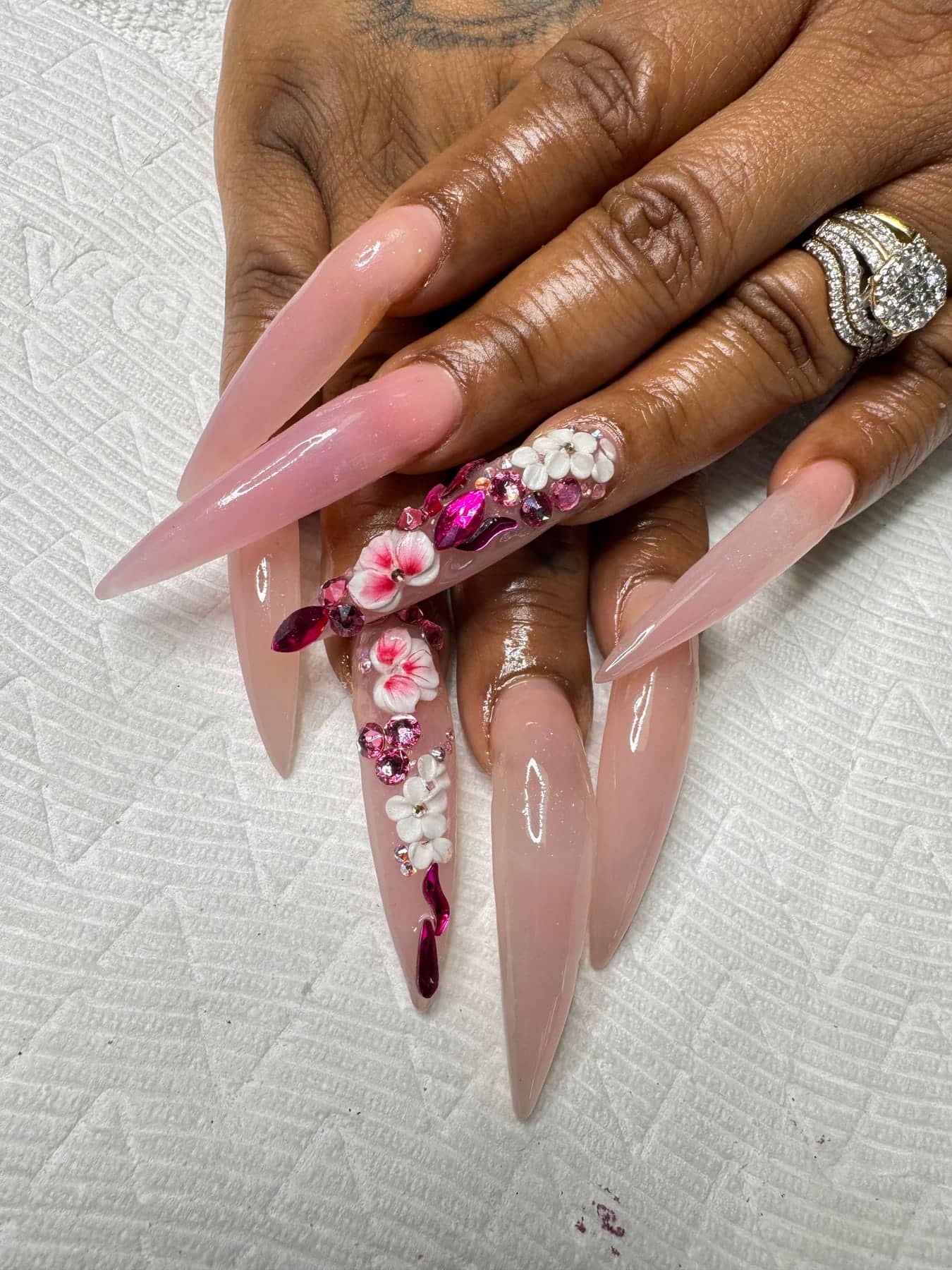 Blush pink nails with floral art