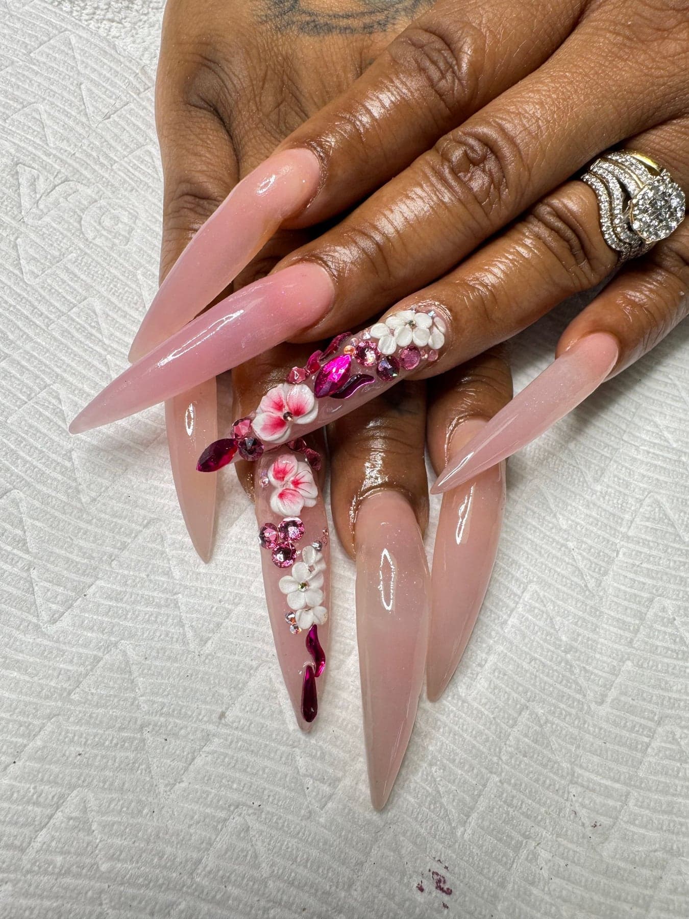 Blush pink nails with floral art
